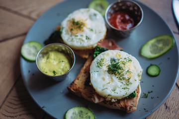 Plate with morning breakfast on the table