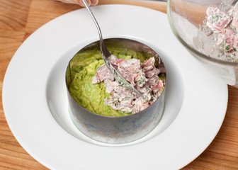 Preparation of healthy avocado and tuna salad