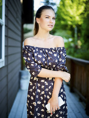 Outdoor atmospheric fashion photo of young beautiful lady