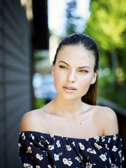Outdoor atmospheric fashion photo of young beautiful lady