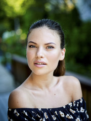 Outdoor atmospheric fashion photo of young beautiful lady
