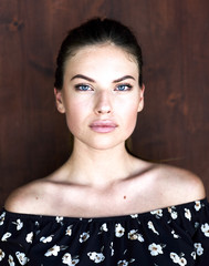 Outdoor atmospheric fashion photo of young beautiful lady