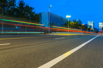 the light trails on the modern building background.