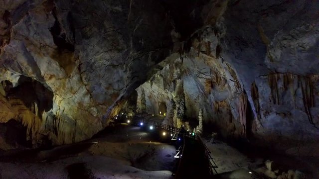 projectors along bridge for tourists light cave walls