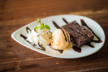 Chocolate vanilla milk ice cream on wood table