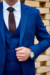 Businessman style. Men style. Man in custom tailored business suit posing outdoors
