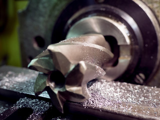 Old geeen milling machine, closeup, metalworking