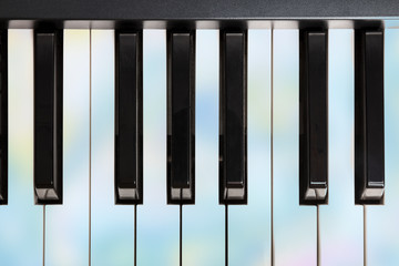 Fototapeta premium Overhead photo of piano keys, toned