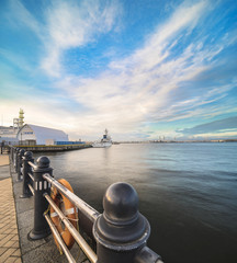 Panorama of Minato Mirai district of Yokohama with a ship moored at the dock of the Japan Coast...