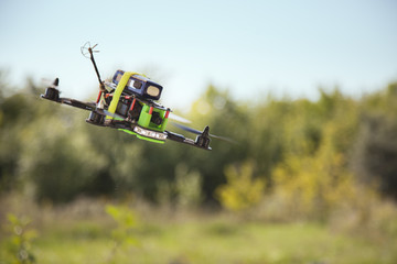 Fototapeta na wymiar racing drones chasing in the sky