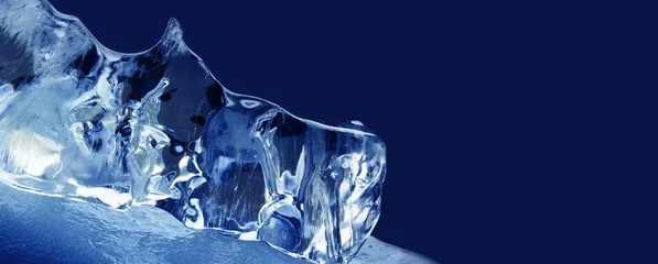 Deurstickers Xmas decorative template background. Textured frozen ice on blue. Abstract frozen water shape macro view. Shallow depth of field, copy space © besjunior