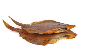 Two smoked headless flatfish