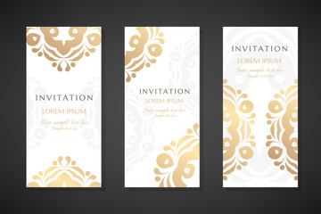 Invitation templates. Cover design with gold ornaments and white background. Vector decorative vertical flayers with copy space.