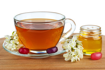 Cup of tea, acacia honey and blossom