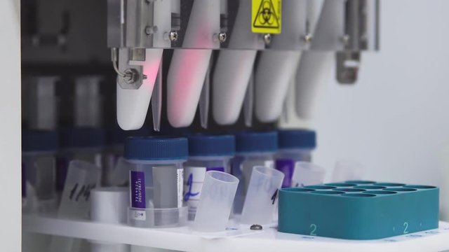 The transfer of biological Material in a test-tube automatically
