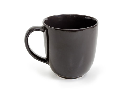 Empty black cup with handle on a white background