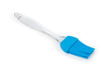 Blue silicone pastry brush on a white background