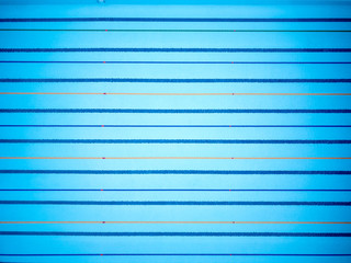 Top view of empty swimming pool for sport by flying drone