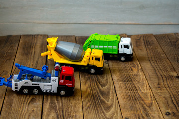 a kids toysa truck concrete mixer and tow truck