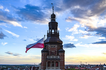 Provincial Office Tower on Haken Terrace in Szczecin with the Polish flag. - obrazy, fototapety, plakaty