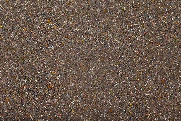 Top view image of chia seeds super-food background. Natural vegan pattern.