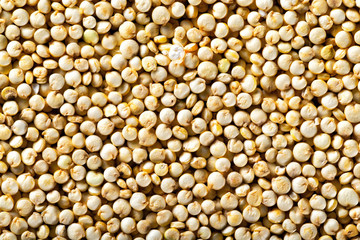 Quinoa grain top view background. Healthy super food pattern.