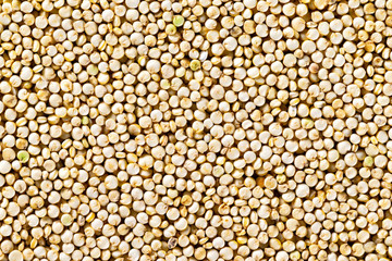 Quinoa grain top view background. Healthy super food pattern.