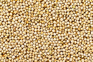 Quinoa grain top view background. Healthy super food pattern.