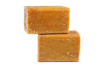 Two bricks of brown common soap