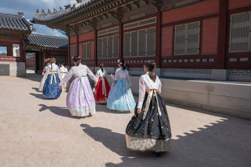 Closeup of women wearing Hanbok Traditional Korean dresses at Gyeongbokgung Palace, Seoul