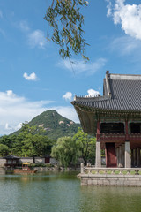 Fototapeta premium Gyeongbokgung Palace with pond and boat