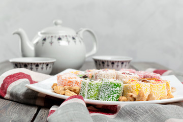 Turkish delight on a wooden table.