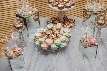 Wedding candy bar. Dessert with a macaroons