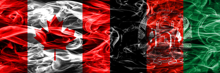 Canada vs Afghanistan smoke flags placed side by side. Canadian and Afghanistan flag together