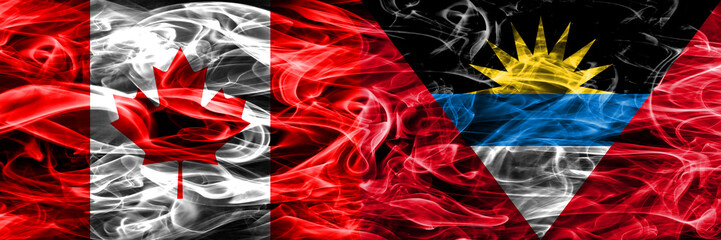 Canada vs Antigua and Barbuda smoke flags placed side by side. Canadian and Antigua and Barbuda flag together