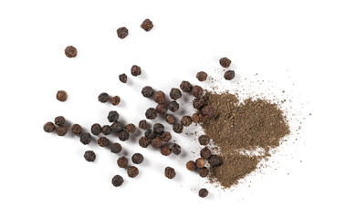 Ground black pepper powder and grains isolated on white background, top view
