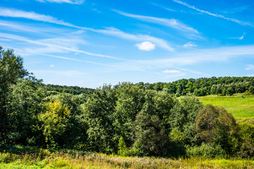 Obraz premium Typical European landscape with small hills and forests