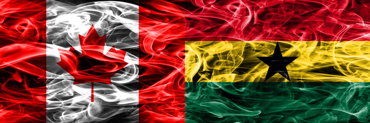 Canada vs Ghana smoke flags placed side by side. Canadian and Ghana flag together