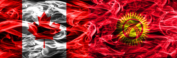 Canada vs Kyrgyzstan smoke flags placed side by side. Canadian and Kyrgyzstan flag together