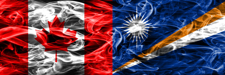 Canada vs Marshall Islands smoke flags placed side by side. Canadian and Marshall Islands flag together