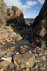 The rocky shoreline at Burrowhead, Scotkand