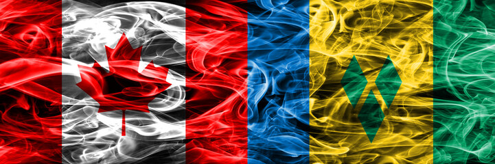 Canada vs Saint Vincent and the Grenadines smoke flags placed side by side. Canadian and Saint...