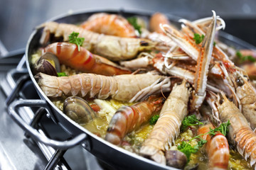 Scampi and paella