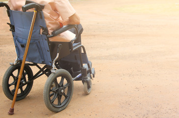 Obraz premium old man is sitting in a wheelchair