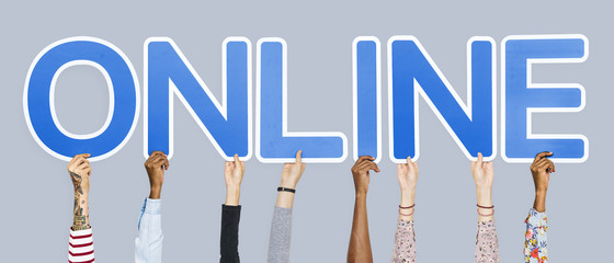 Hands holding up blue letters forming the word online