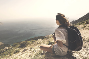 traveler woman looking and meditatind  the spetacular view