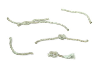 Obraz premium Old, used dirty rope isolated on white background, top view