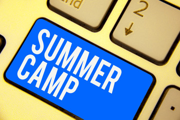 Text sign showing Summer Camp. Conceptual photo Supervised program for kids and teenagers during summertime. Keyboard blue key Intention create computer computing reflection document.