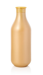 Golden bottle with plastic cap.