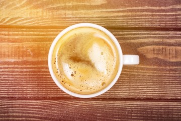 Coffee cup on desk